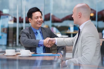 Business hand shake deal depositphotos 32650223 petit